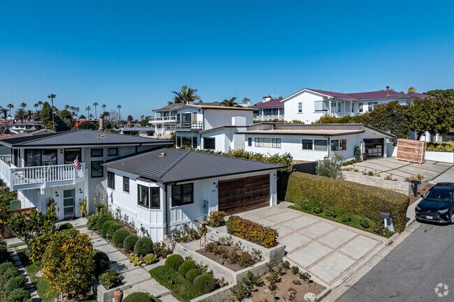 Elegant estates with scenic views from Newport Heights, minutes from the harbor and beaches.