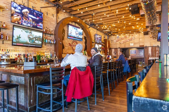 Grab some drinks with friends at the cozy Firewater Saloon in Edison Park.