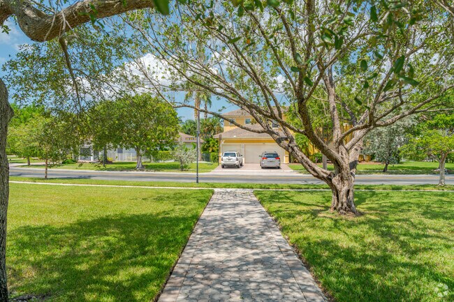 Sidewalks in Harbour Lake Estates are often shaded by overhanging trees.