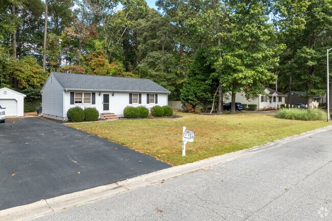 Enjoy a nicely sized yard in Johnson Pond.