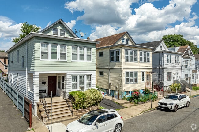 Totowa Section features narrow colonials with classic front stoops and leafy sidewalks.