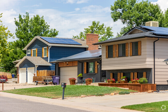 Sidewalk-lined streets feature a mix of spacious single-family homes, condos and townhouses.