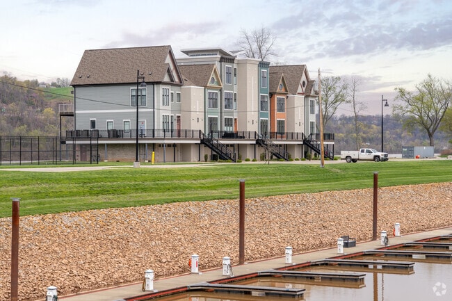 Harbor Point is a developing community in Boaz, WV, featuring luxury townhomes, and a private marina with 60 reserved boat slips.