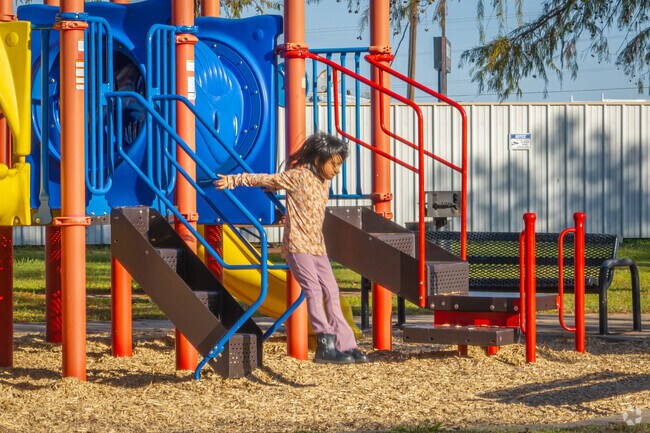 The playground at Sunrise Park in Owen Point lets children jump and play freely.
