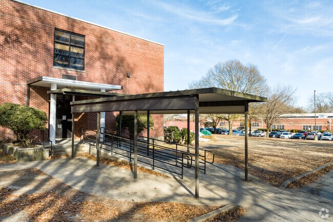 The covered awning at Avon Lenox School in Memphis keeps students dry on rainy days.
