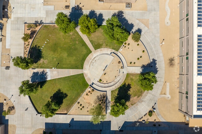 Scottsdale’s Saguaro High School students can relax in the grass between classes.