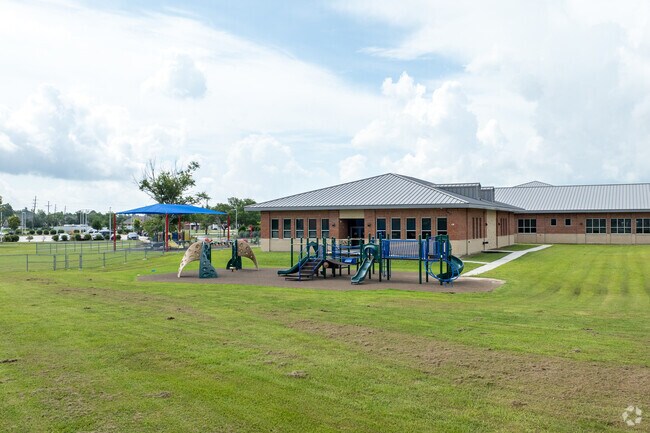 Students at Lake Pontchartrain Elementary enjoy playing on the playground during recess.