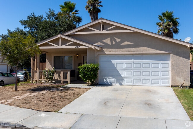 Multistory Mediterranean-inspired abodes with Spanish tile roofing and arched entryways line the streets of Piru.