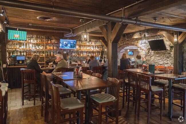 The bar at the Carriage Inn in Allenton occupies part of the original structure with stone walls.