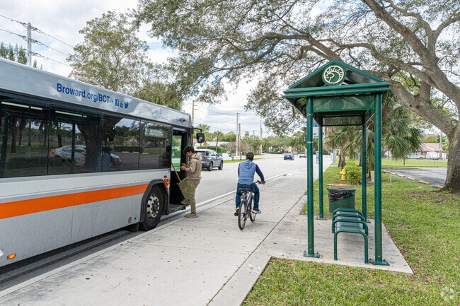 There are bus stops all along Sample Road in Holiday Springs.