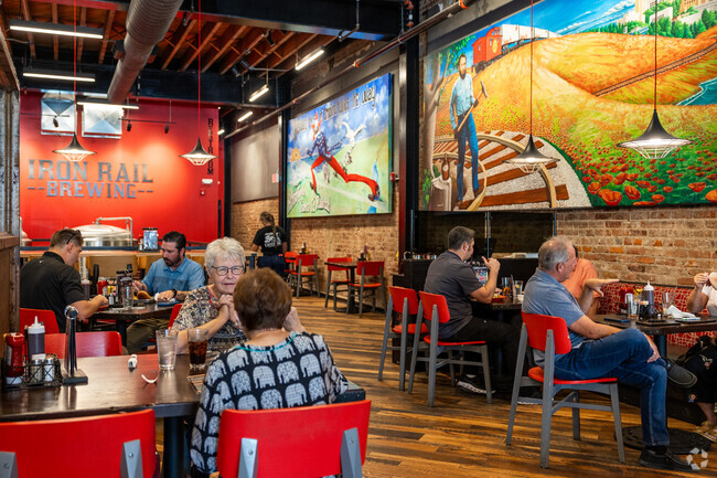 Iron Rail Brewing is a hip gastropub honoring Holliday's contributions to Downtown Topeka.