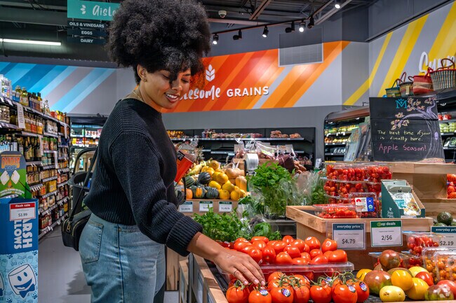 North River Fronts residents shop the fresh produce at Menomonie Market Food Co-Op.