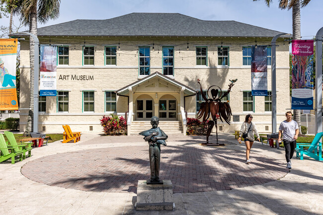 A happy couple walks out of the Cornell Art Museum in downtown DelRay Beach.