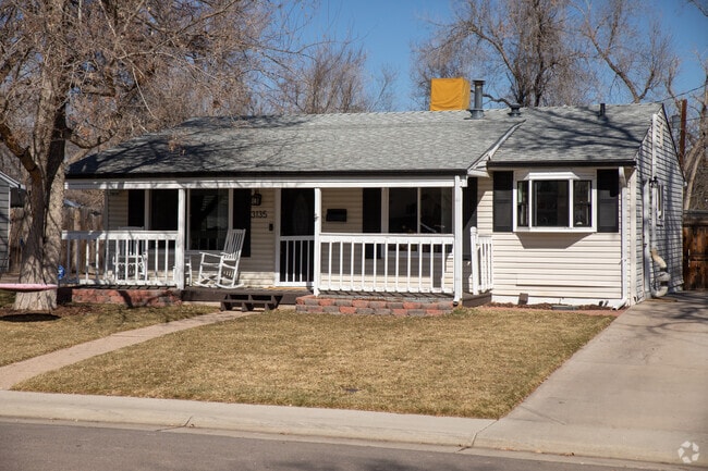 This ranch style home in Sheridan has a covered porch and off street parking.