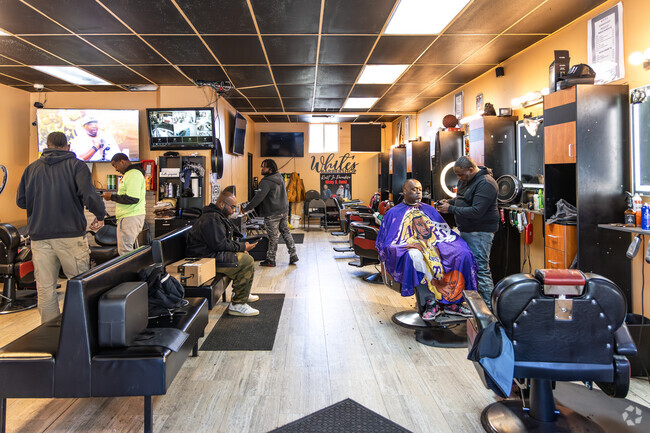 White's Barber Shop has been a fixture in the Amani neighborhood for 65 years.