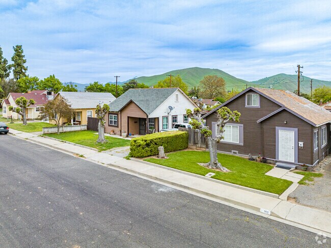 Craftsman inspired bungalows bunch together in this Woodlake neighborhood.