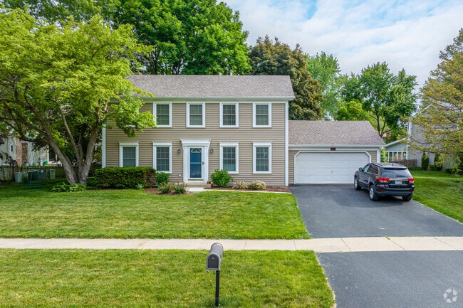 Popular with residents of Brush Hill this is a Colonial style home.