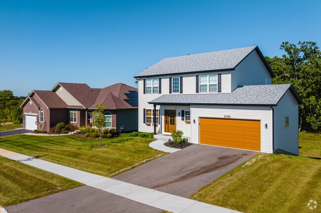 Homes in Hidden Creek vary in style, each with spacious driveways and yards.