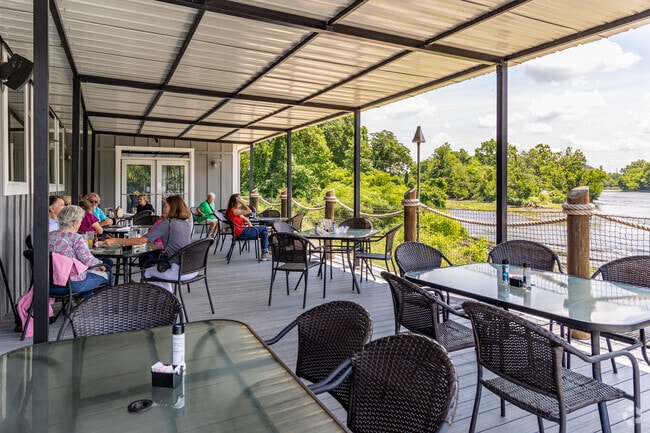 Enjoy a relaxing lunch or dinner out on the balcony overlooking the South Fork Holston River at Riverfront Seafood Company.