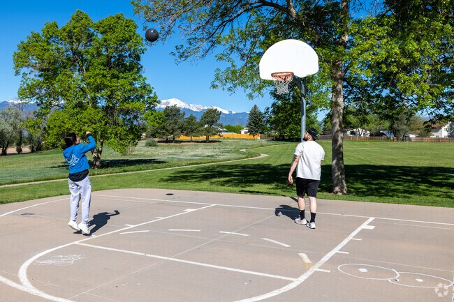Play some basketball with friends at Henry Park.