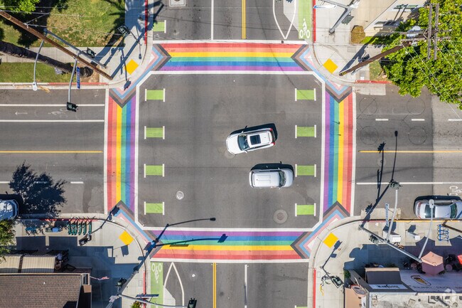 An intersection in Bluff Heights has rainbow crossways.