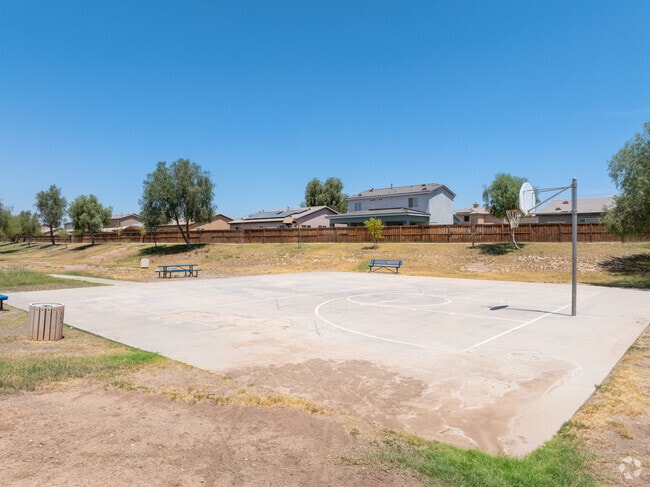 Estancia Park features basketball courts for kids and adults a like to play a game of pick up.