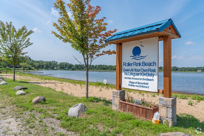 You can sit out on the sandy shoreline and beach at Roller Rink Park.