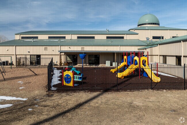 Kids can climb on the playground at Annoor Islamic School.