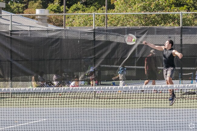 Northbrae residence enjoy a casual game of tennis at Live Oak Park.