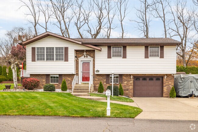 Residents in Old Forge, PA enjoy spacious living with garages in their craftsman style homes.