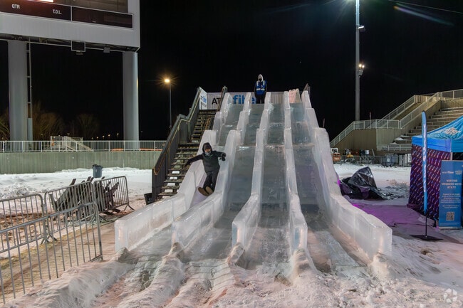 Festival fans, get ready for a thrilling ride on the AT&T Fiber Hyper-Fast Ice Slide at the Minnesota Ice Festival.