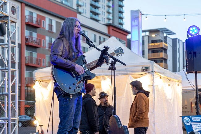 Live music plays throughout the evening at Phoestivus in Phoenix.