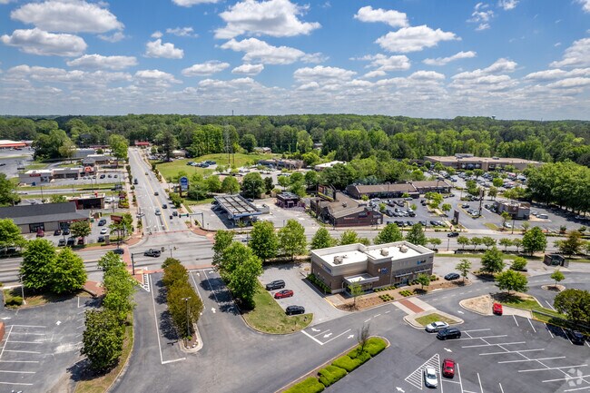 Visit the vibrant Greenbrier, where you can indulge in a delightful dining experience and explore a diverse selection of grocery shopping options, all in one convenient location.