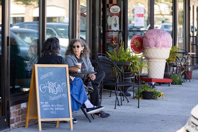 Ardmore-Gould Estates-Olin Heights residents sit outside of Habersham Village.