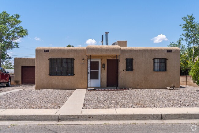 Find a character rich Pueblo home with a warm, earthy aesthetic in the lovely Quigley Park neighborhood.