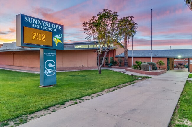 Sunrise illuminates Sunnyslope High School at sunrise in North Mountain Village.
