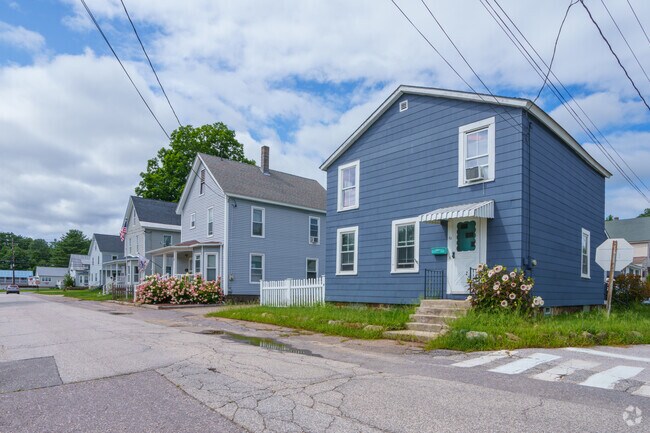 Streets in Northfield have homes that  maintain character with different shades of blue.