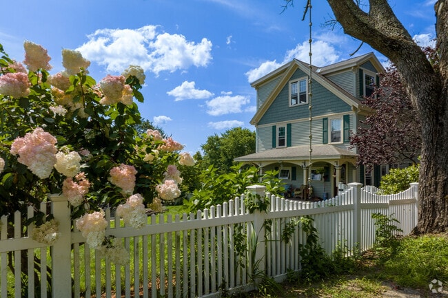 A picket lined yard on Christian Hill in Centralville delights the senses.