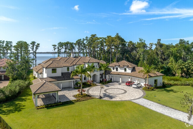 This Mediterranean-style mansion sits on a beautifully manicured lawn in Windermere.
