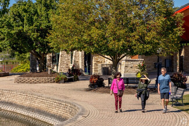 Northwest Batavia residents enjoy a walk along the Batavia Riverwalk.
