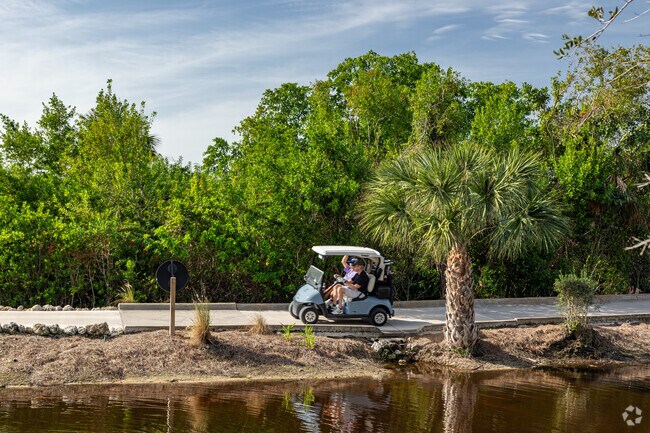 Many Pelican Landing residents get around the community on a golf cart.