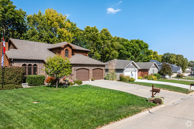 Candlewood homes can have brick facades and shaded back yards.