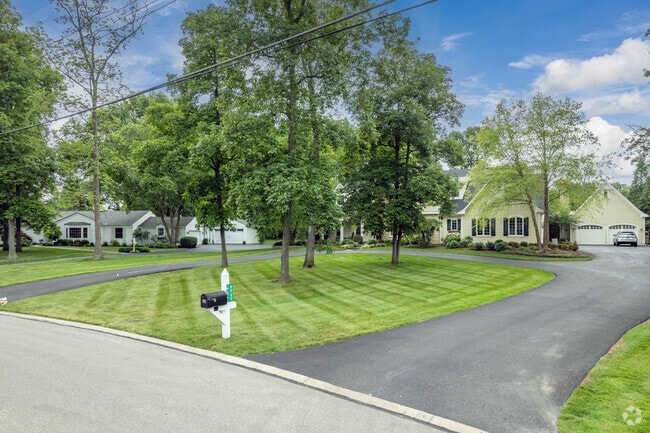A row of homes in Indian Hill shows off the variety of architecture in the neighborhood.