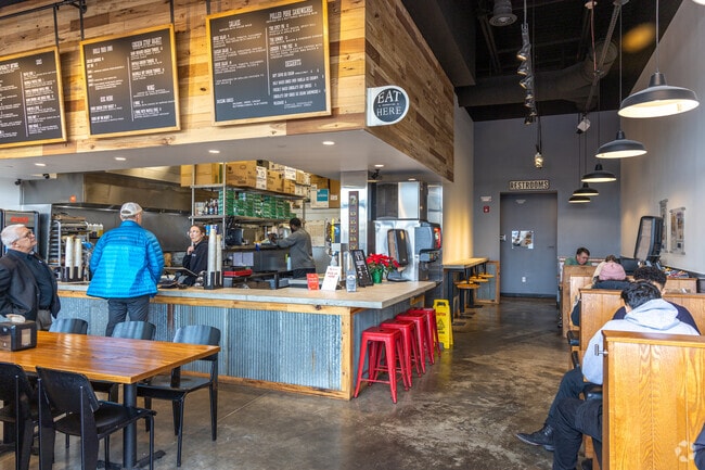 Chicken & The Pig is one of many delicious restaurants in the Marketplace at Lynnfield Shopping area, offering hand-breaded chicken sandwiches, gourmet hot dogs, shakes, and more!