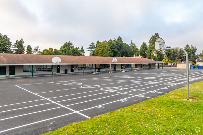 Students at Washington Elementary School can play basketball on the blacktop.