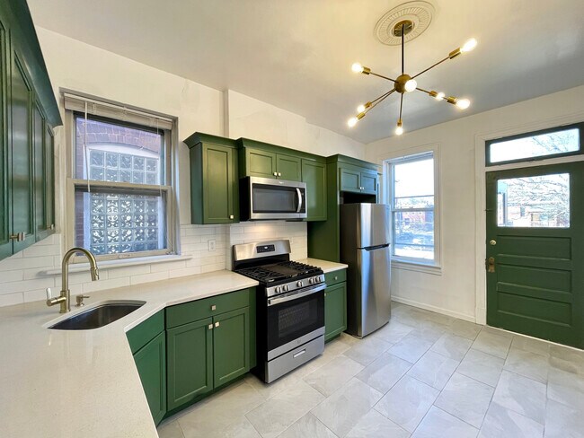 Kitchen with Walk-Out Balcony