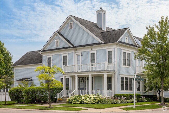 Large traditional homes with manicured landscaping are common in Canton Township.