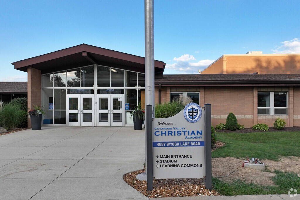 The Cuyahoga Valley Christian Academy sign welcome students, faculty, and parents.