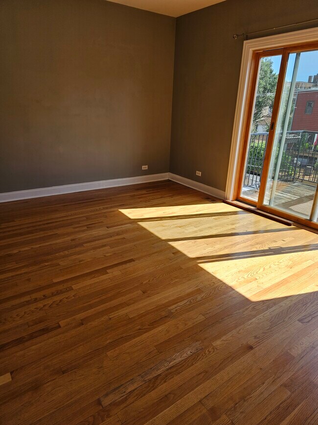 Bedroom 1, which leads to balcony