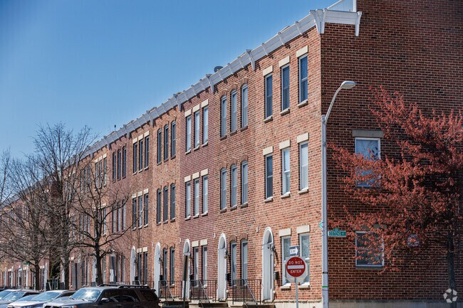 Traditional row-homes dot the streets in Sharp-Leadenhall.